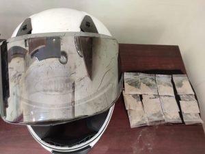 Youth caught with brown sugar stuffed in helmet Cops seize 90 grams of brown sugar, register case