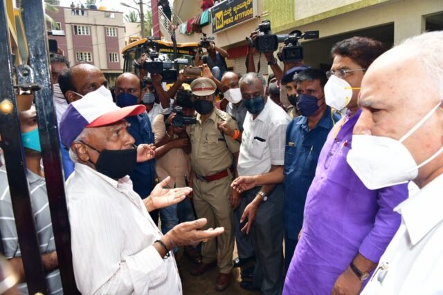 CM announces Rs 25,000 relief for rain-hit families Yediyurappa visits Hosakerehalli, orders quick clearing of drain