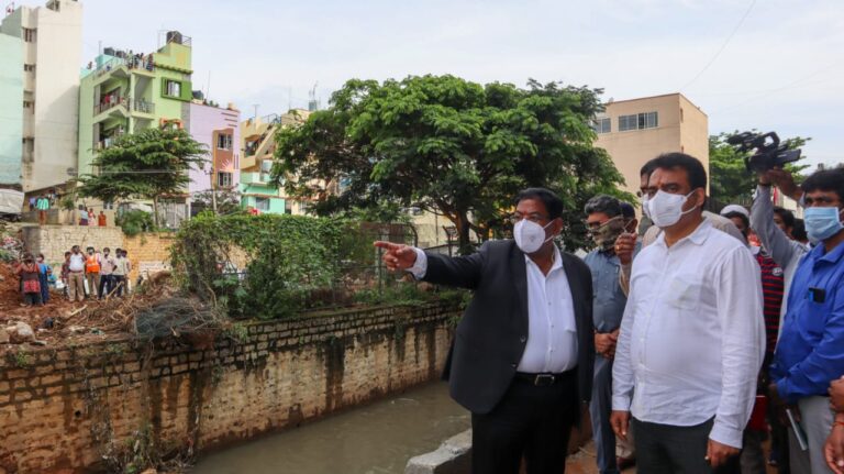 DCM orders razing of structures atop storm water drains Narayan feels drilling holes inside drains will make rain water recede!