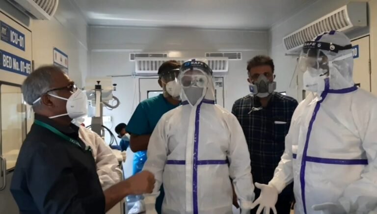 Karnataka DyCM wears PPE Kit and talks to Covid-19 infected patients 1