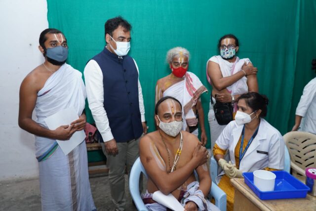 Priests in Malleswaram were vaccinated at Rotary club community house on Monday. Deputy Chief Minister Dr. CN Ashwath Narayana was present on the occassion. Priests in Malleswaram were vaccinated at Rotary club community house on Monday. Deputy Chief Minister Dr. CN Ashwath Narayana was present on the occassion.