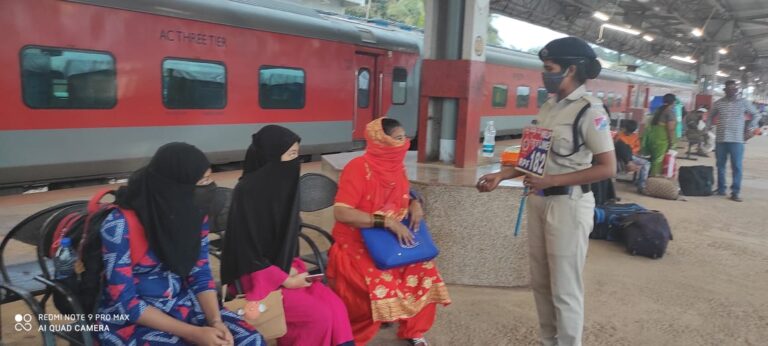 A team member of Railway Protect Force is seen during spreading awareness to ensure safe Journey of lady passengers. 3