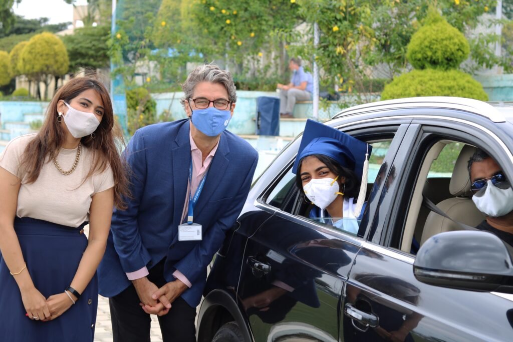 Resilient students finally get to celebrate drive thru graduation at Canadian International School