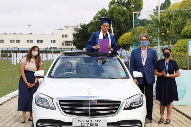 Resilient students finally get to celebrate drive thru graduation at Canadian International School