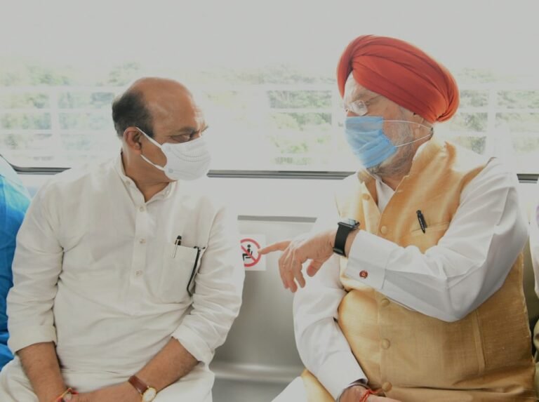 Chief Minister Basavaraj Bommai with Union Minister Hadeep Singh Puri