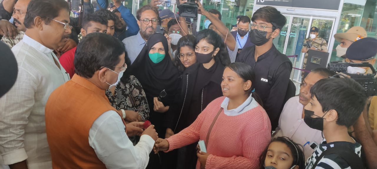 Union Minister Pralhad Joshi welcomes Kannadiga Ukraine returnees at Bengaluru Airport