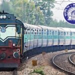 Passenger train on a curved railway track — file photograph
