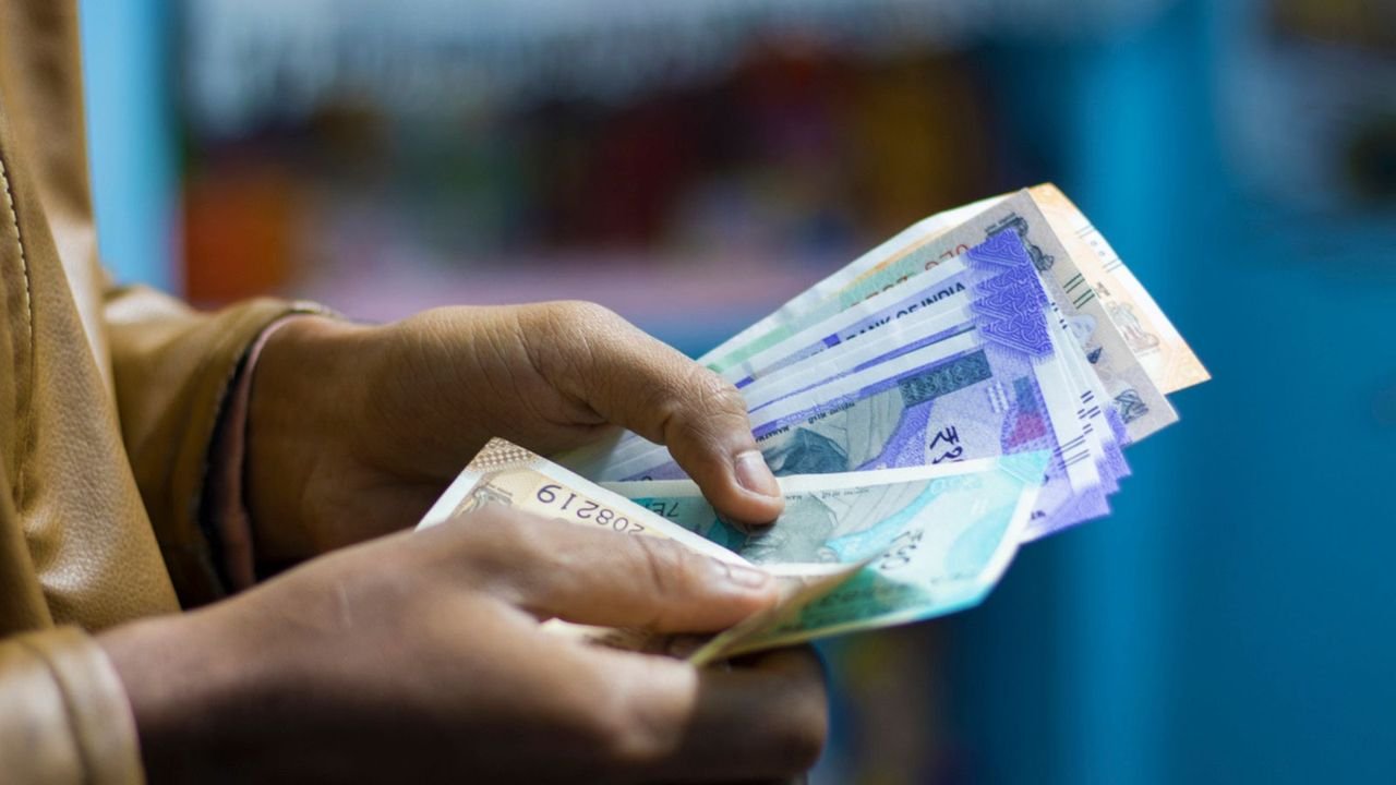 Rupee recovers from all-time low to settle 6 paise higher at 84.40 against US dollar