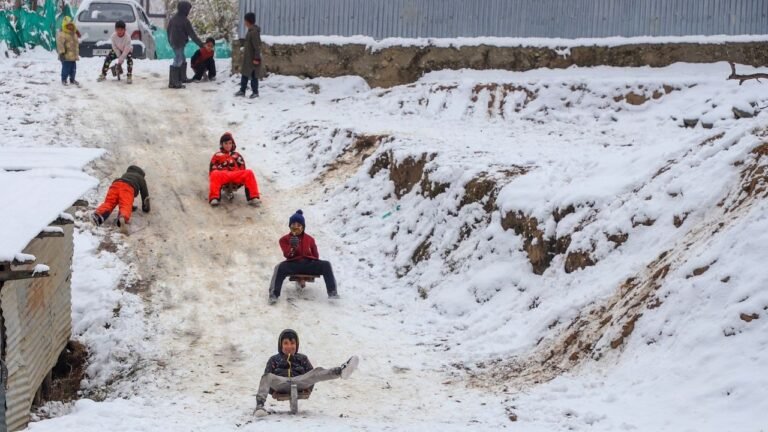 Season’s first snowfall in Kashmir plains, north India shivers, rain lashes south