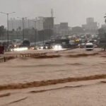File photograph of rainwater on a Bengaluru road