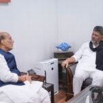 D.K. Shivakumar seated with the Union Defence Minister during their New Delhi meeting