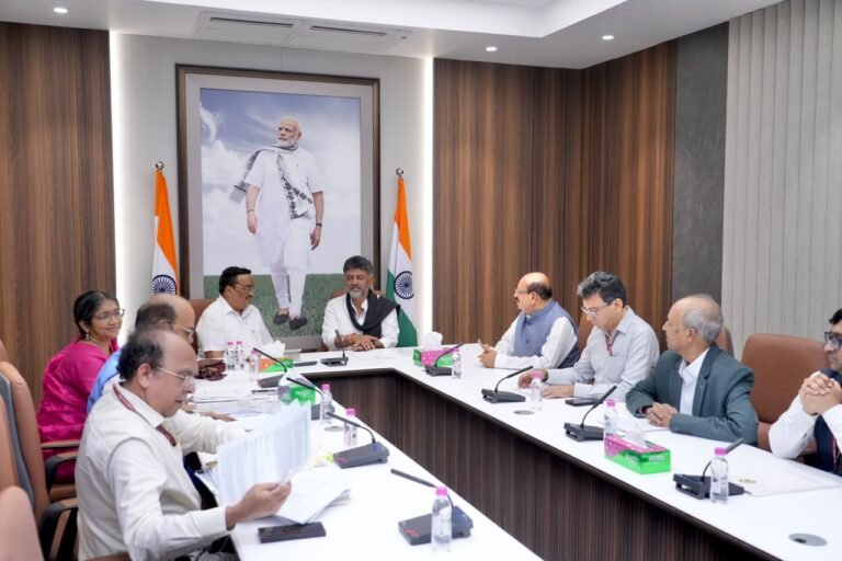 D.K. Shivakumar and C.R. Patil at a meeting with officials in New Delhi