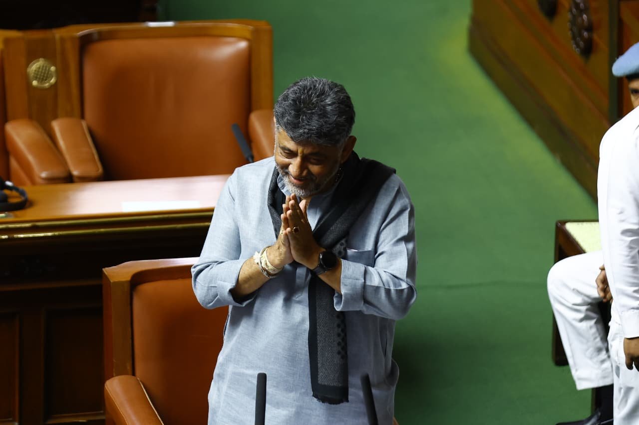 D K Shivakumar with folded hands in the Karnataka Legislative Assembly