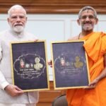 Prime Minister Narendra Modi with Pejawar Matha seer Vishwaprasanna Tirtha Swamiji at the birth-centenary logo unveiling
