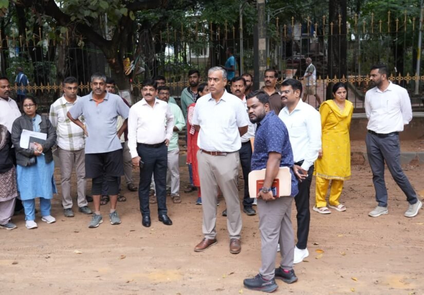 Maheshwar Rao and civic officials inspecting the Domlur area in Bengaluru