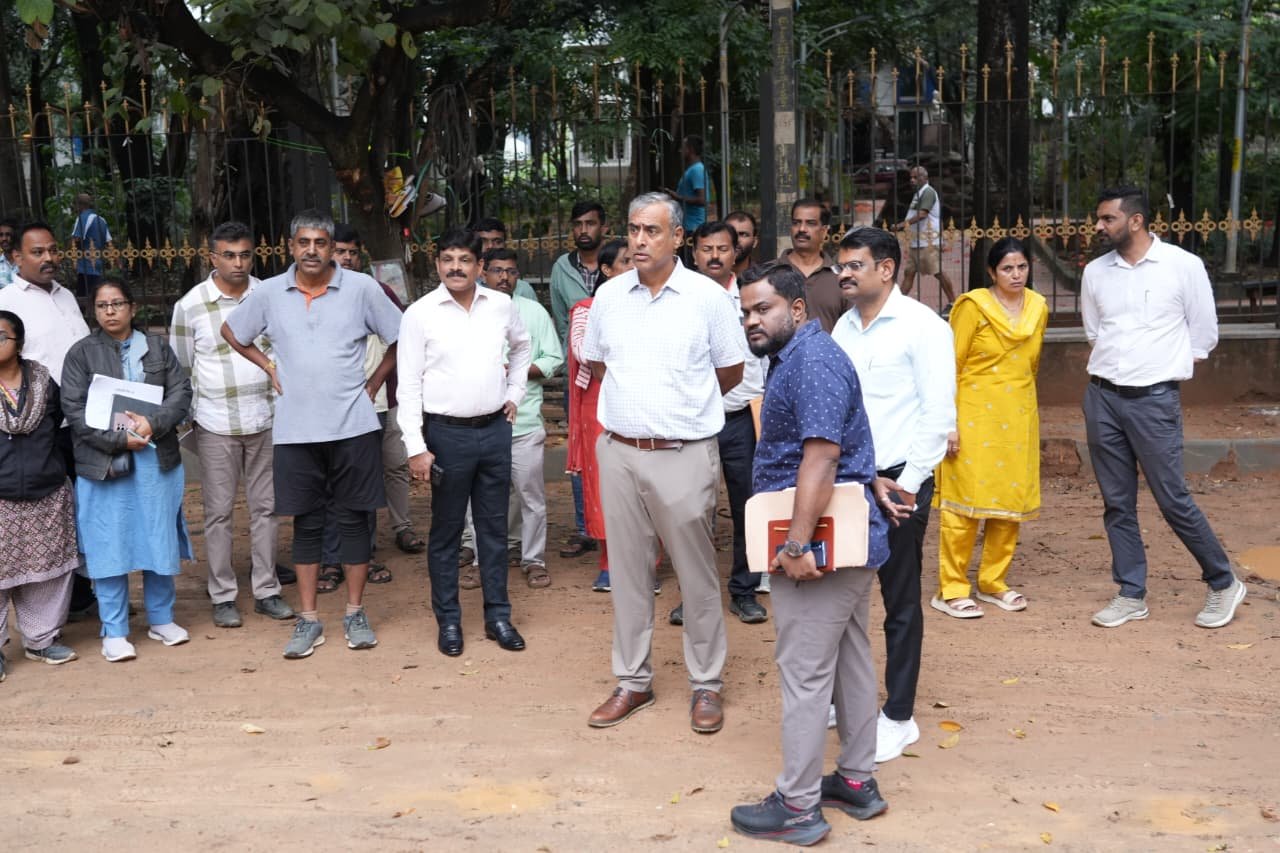 Maheshwar Rao and civic officials inspecting the Domlur area in Bengaluru
