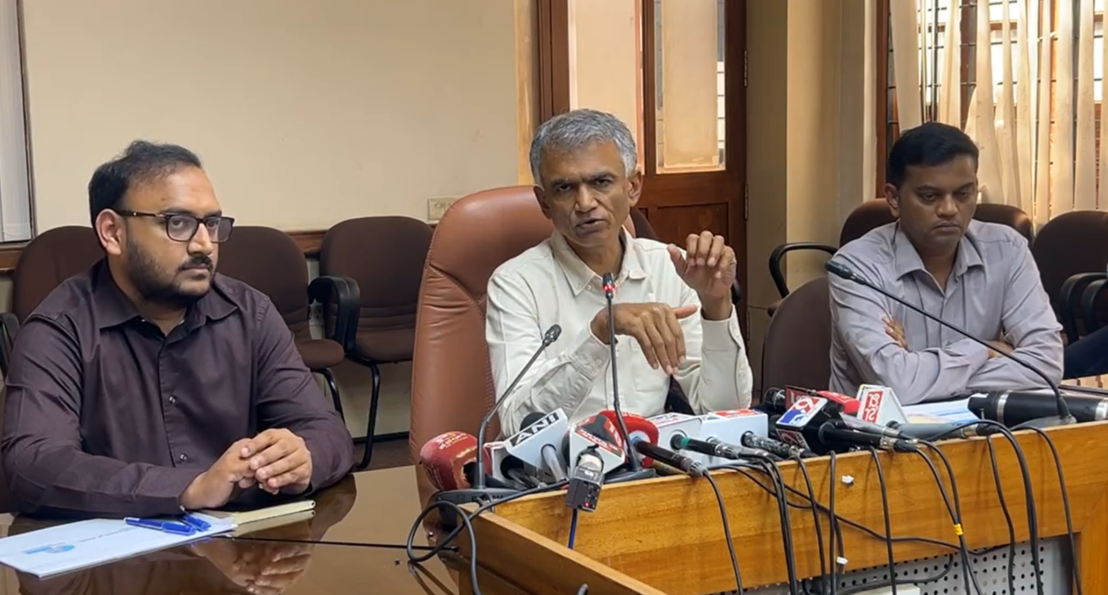 Krishna Byre Gowda addressing a media briefing with officials seated beside him