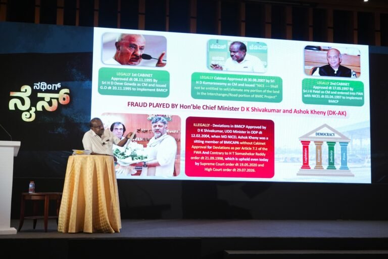 HD Kumaraswamy points to a presentation about BMIC agreements at a press conference