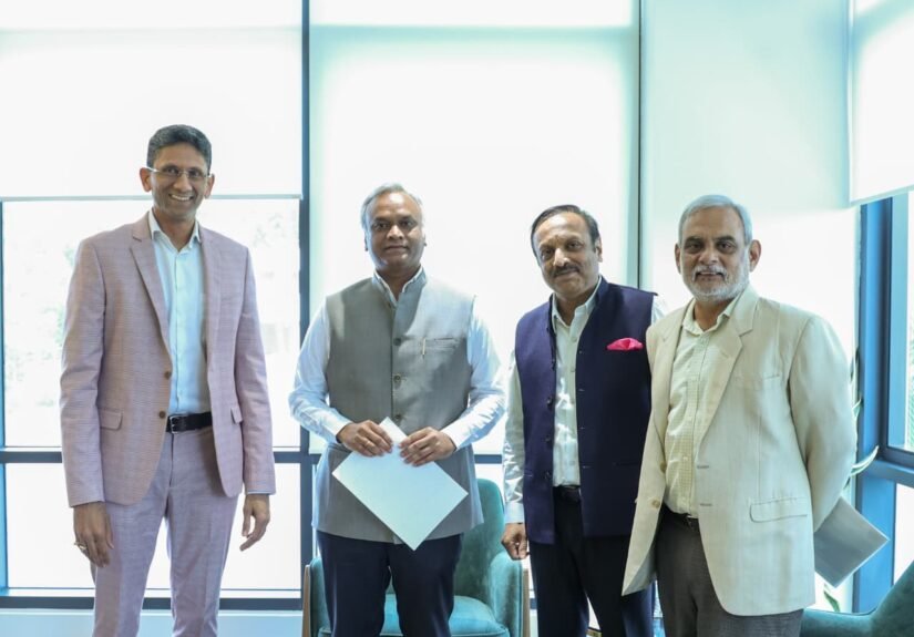 Priyank Kharge with Venkatesh Prasad and cricket association representatives