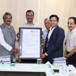 K.J. George and officials hold BESCOM’s information security certification at Energy Bhavan
