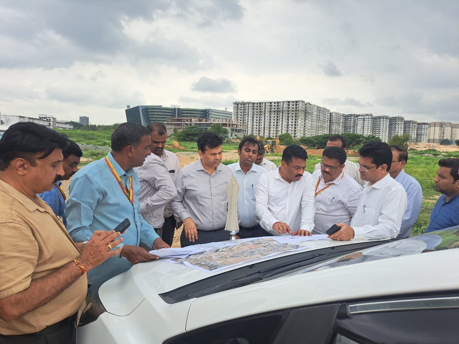 Bengaluru Urban district officials examine land records during the Kadagrahara government land recovery operation