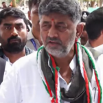 D K Shivakumar speaks to reporters near Sirigere Mutt in Chitradurga