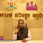 File image of Karnataka Examinations Authority Executive Director H. Prasanna seated before the KEA name and emblem