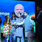 Pralhad Joshi with students and guests at the Seva First Innovation Challenge event at IISc Bengaluru