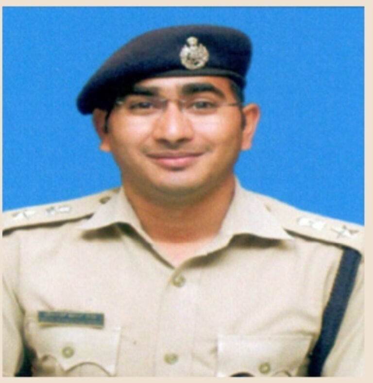 Dharmender Kumar Meena in police uniform