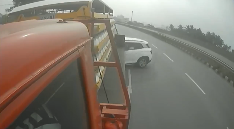 CCTV frame of a white car colliding with a lorry on NH48 in Davanagere
