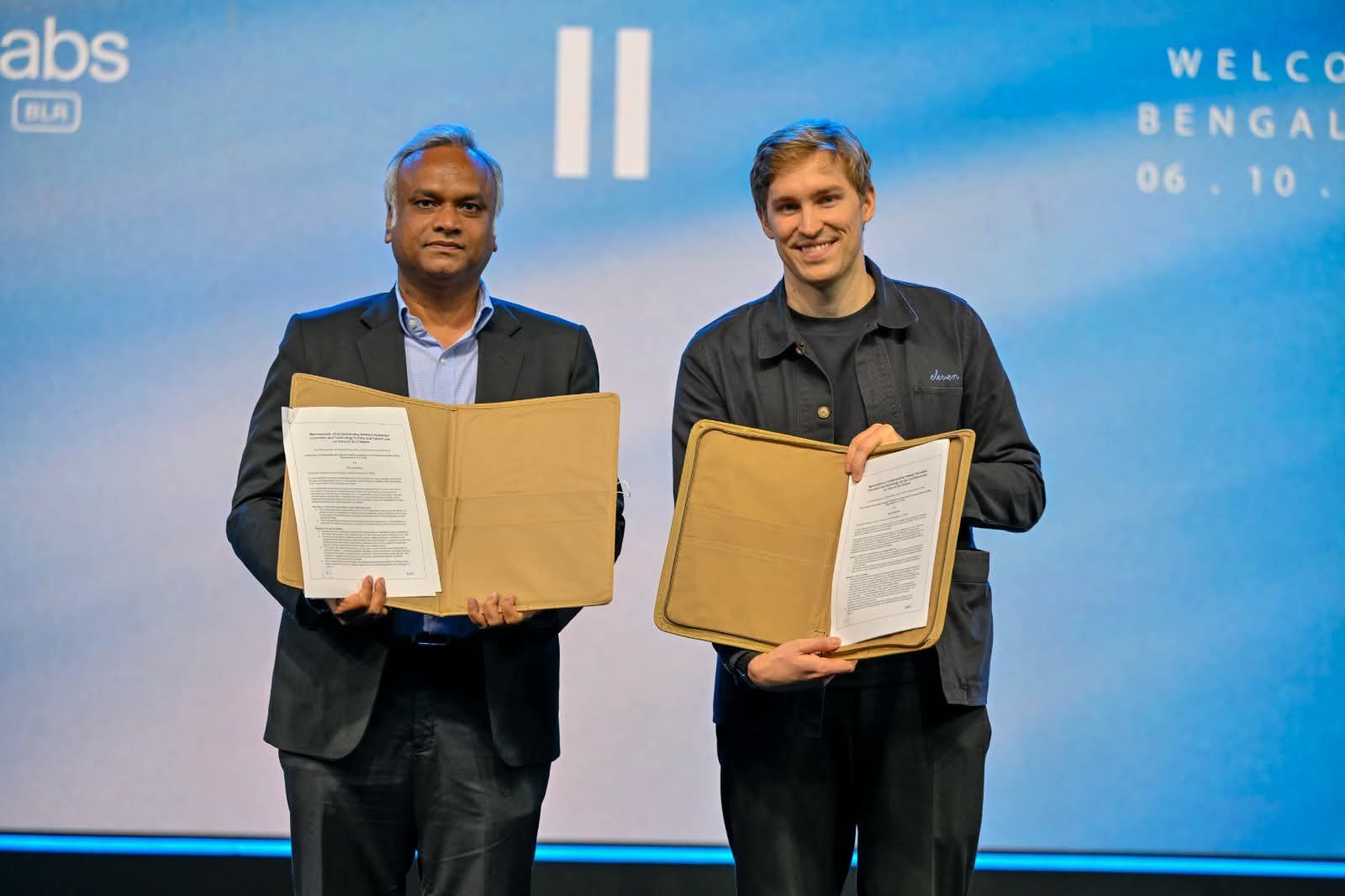 Karnataka and ElevenLabs representatives display the signed MoU