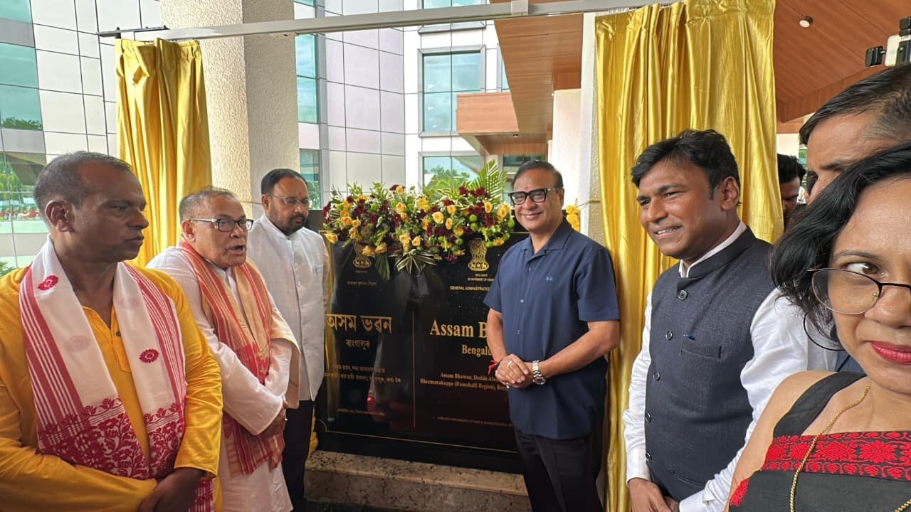 Himanta Biswa Sarma and guests beside the inauguration plaque at Assam House in Bengaluru