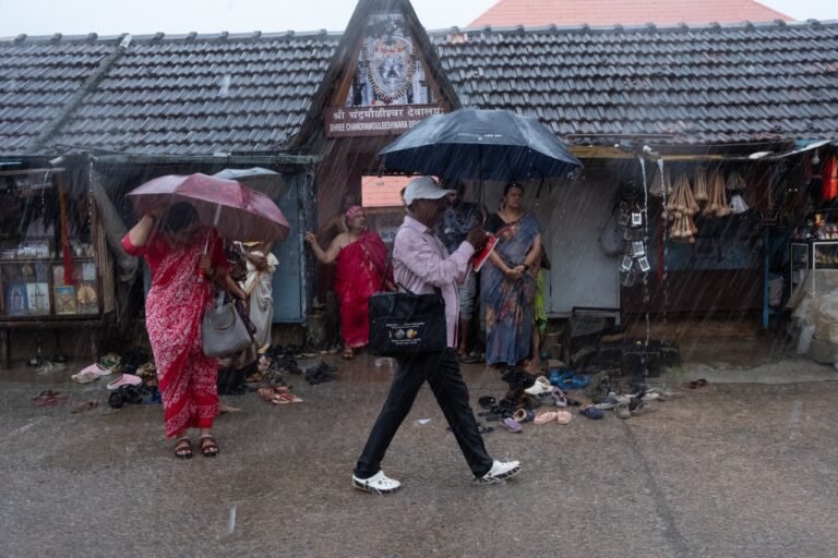 SIR 2026 fieldwork in Udupi district during rain, in an official CEO Karnataka photograph