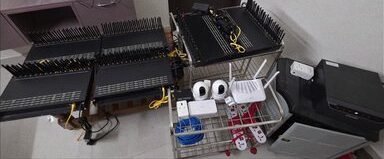 Seized SIM-box equipment pictured in the image shared by Priyank Kharge on X
