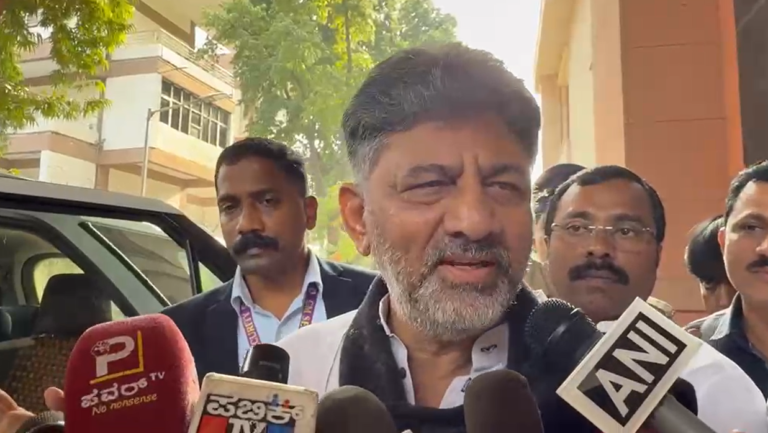 D K Shivakumar speaks to reporters near Karnataka Bhavan in New Delhi