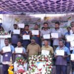 Sanitation staff hold Swachh Local Heroes certificates at the Jayanagar felicitation