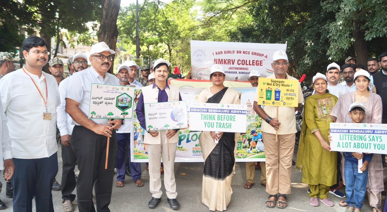 Participants carry cleanliness and waste segregation placards in Jayanagar