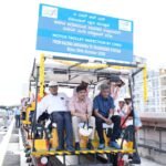 Namma Metro Pink Line CMRS inspection team on a motor trolley between Kalena Agrahara and Tavarekere