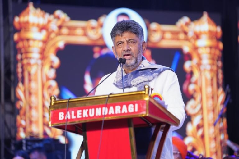 D. K. Shivakumar speaks at a podium during the Kittur Utsav on October 25.