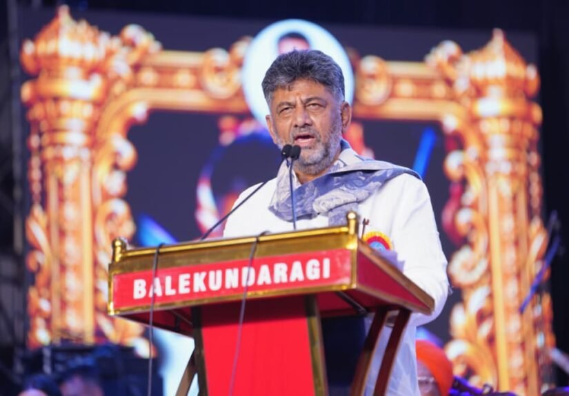 D. K. Shivakumar speaks at a podium during the Kittur Utsav on October 25.