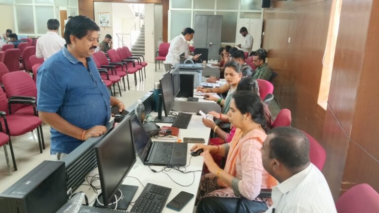 Citizens and staff at an e-Khata service desk in Bengaluru North