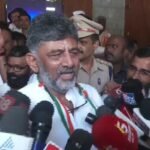 D.K. Shivakumar speaking to reporters near Gandhi Bhavan in Bengaluru