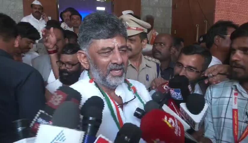 D.K. Shivakumar speaking to reporters near Gandhi Bhavan in Bengaluru