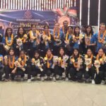 Indian women hockey team and officials at the Bengaluru airport welcome after Asian Games gold