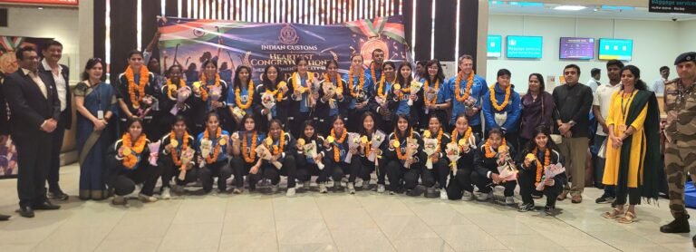 Indian women hockey team and officials at the Bengaluru airport welcome after Asian Games gold