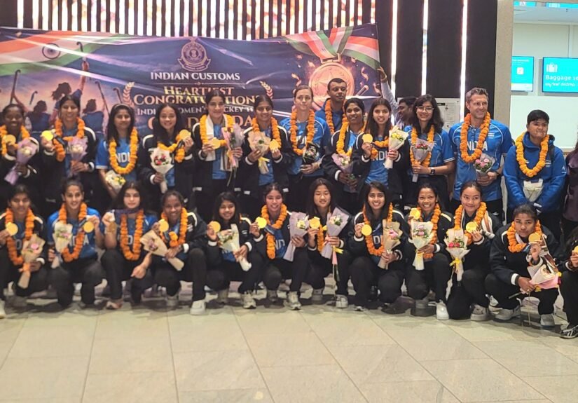 Indian women hockey team and officials at the Bengaluru airport welcome after Asian Games gold