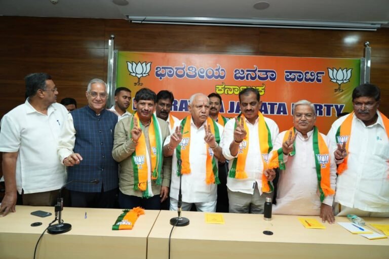B S Yediyurappa speaks to the media alongside BJP leaders at a Bengaluru press conference.