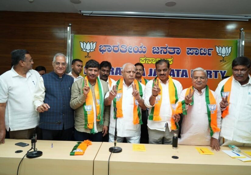 B S Yediyurappa speaks to the media alongside BJP leaders at a Bengaluru press conference.